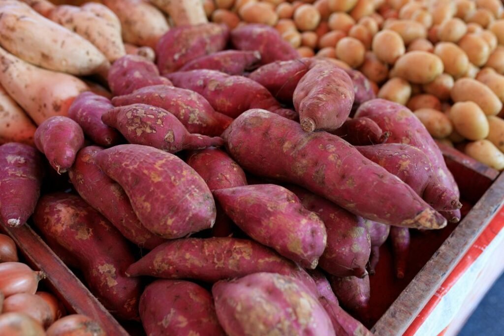 Sweet taste in Ayurveda shown with fruits grains and root vegetables